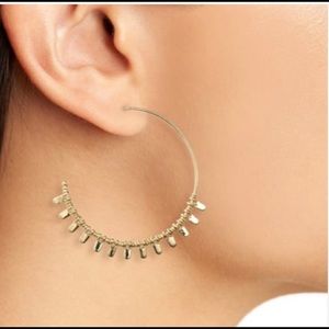 NWT. Stella & Dot Petal Hoops in Gold.